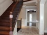 Main Hallway - Milled Cherry Wood Staircase with Iron Baluster