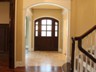 Hallway - White Birch Hardwood Floors, Cased Opening, Travertine Stone Tile