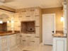 Master Bathroom Suite with Marble Floors, Custom Cabinets & Fireplace