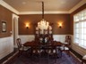Dining Room with Wainscoting and Chandelier