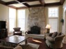 Family Room with Cherry Hardwood Floors and Coffered Ceiling