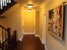 Second Floor Hallway with Cherry Wood Staircase and Cherry Wood Floors