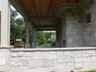 Two Story Back Terrace with Fireplace & Bead board Ceiling Detail