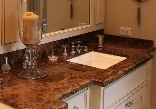 Under-mount rectangle sink and  sink faucet with cross handles by Battaglia Homes, Hinsdale, IL